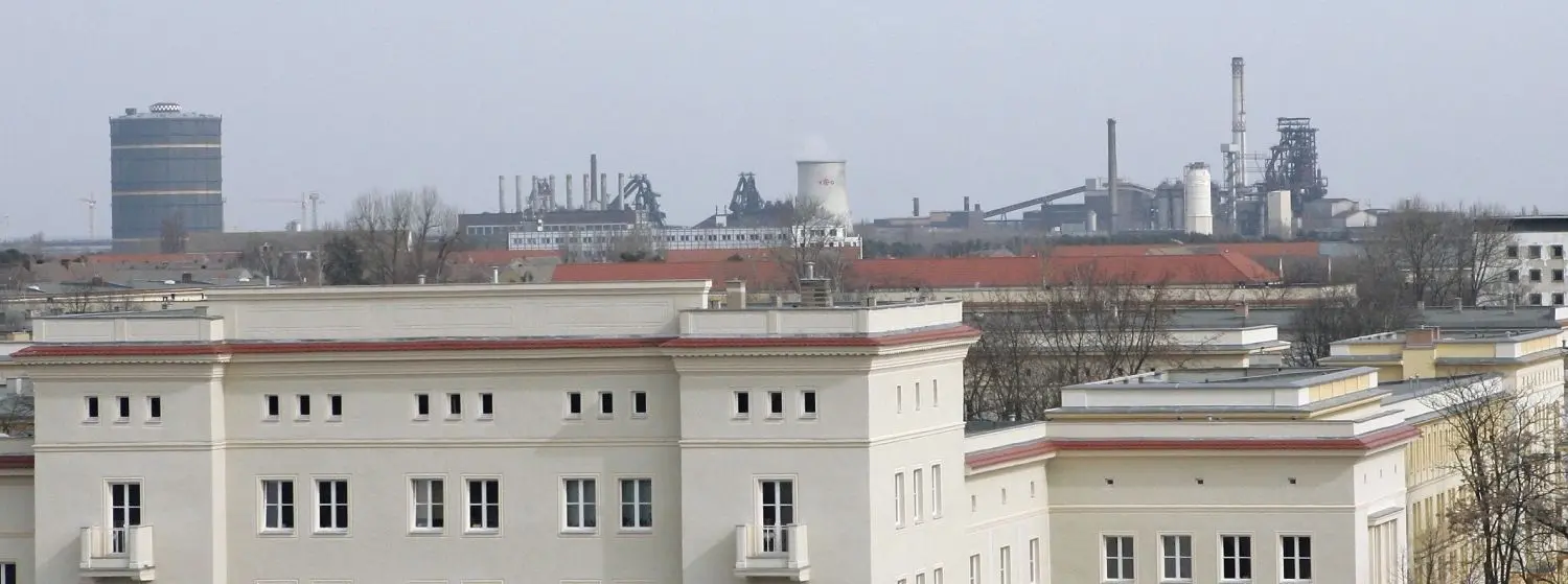 Eisenhüttenstadt: ArcelorMittal im Hintergrund, Stadt und Werk