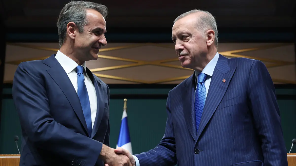 In this handout photograph taken and released by the Turkish Presidency Press Service on May 13, 2024, Turkey's President Recep Tayyip Erdogan (R) shakes hands with Greek Prime Minister Kyriakos Mitsotakis at the end of their joint press conference in Ankara. (Photo by Turkish Presidental Press Service / TURKISH PRESIDENTIAL PRESS SERVICE / AFP)