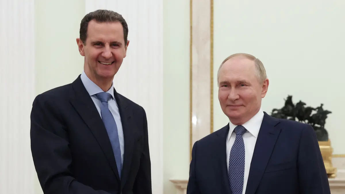 In this pool photograph distributed by the Russian state agency Sputnik on July 25, 2024, Russia's President Vladimir Putin (R) meets with Syria's President Bashar al-Assad at the Kremlin in Moscow on July 24, 2024. (Photo by Valery SHARIFULIN / POOL / AFP) / Editor's note : this image is distributed by Russian state owned agency Sputnik