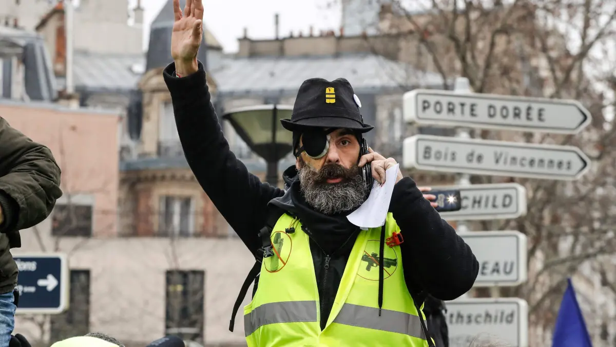 (FILES) French Gilet Jaune movement leader Jerome Rodrigues is pictured at the start of a march on February 2, 2019 in Paris, called to pacifically protest against police violence toward participants of the last three months demonstrations in France, as Yellow vest protesters take to the streets for the 12th consecutive saturday today. A police officer, suspected of putting the eye out of ?yellow vest? protester Jerome Rodrigues with a disencerclement hand grenade in January 2019 in Paris, will stand trial before the departmental criminal court, a source close to the case said on January 24, 2025. (Photo by FRANCOIS GUILLOT / AFP)
