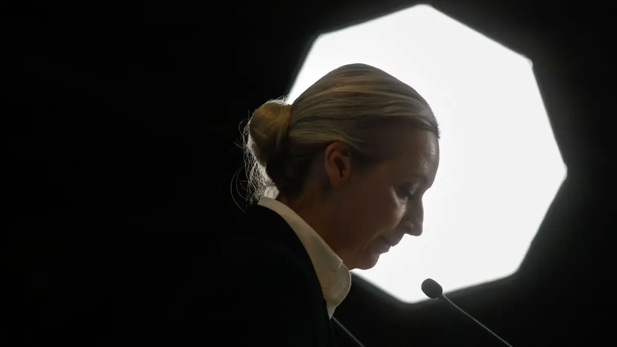 The co-leader of the far-right Alternative for Germany (AfD) party Alice Weidel gives a statement after German MPs narrowly voted against a bill to restrict immigration proposed by the conservative CDU/CSU with the controversial support of the AfD during a debate at the Bundestag (lower house of parliament) focusing on immigration, on January 31, 2025 in Berlin. (Photo by Odd ANDERSEN / AFP)