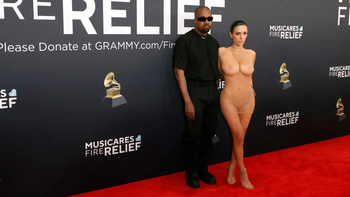 67th GRAMMY Awards - Arrivals: LOS ANGELES, CALIFORNIA - FEBRUARY 02: (FOR EDITORIAL USE ONLY) (EDITOR'S NOTE: Image contains nudity.) (L-R) Kanye West and Bianca Censori attend the 67th GRAMMY Awards on February 02, 2025 in Los Angeles, California. Frazer Harrison/Getty Images/AFP (Photo by Frazer Harrison / GETTY IMAGES NORTH AMERICA / Getty Images via AFP)