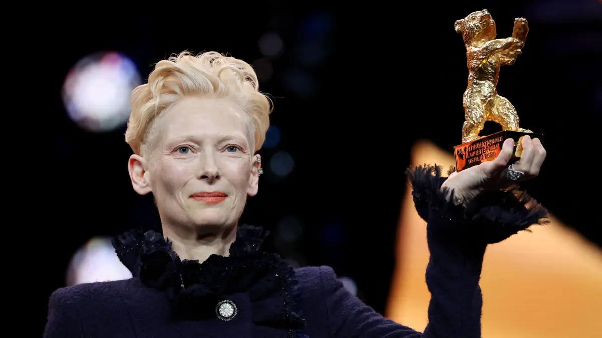 776282772: Scottish actress Tilda Swinton poses on stage after having been presented with the Honorary Bear of the Berlinale during the opening ceremony ahead of the screening of the film ?Das Licht? (The light) in the "Berlinale special" section of the 75th Berlinale, Europe's first major film festival of the year, in Berlin on February 13, 2025. (Photo by Ronny HARTMANN / AFP)