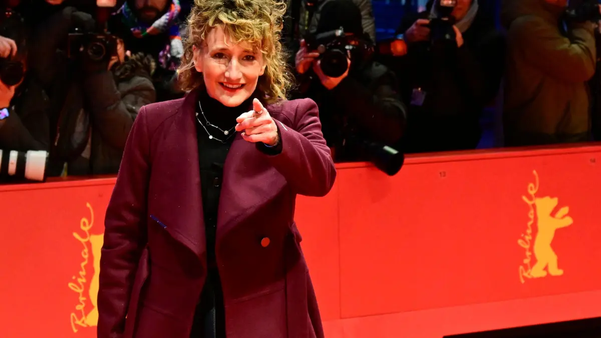 776282771: Berlinale director Tricia Tuttle poses for photographers upon arrival on the red carpet for the opening ceremony and the screening of the film ?Das Licht? (The light) in the "Berlinale special" section of the 75th Berlinale, Europe's first major film festival of the year, in Berlin on February 13, 2025. (Photo by John MACDOUGALL / AFP)
