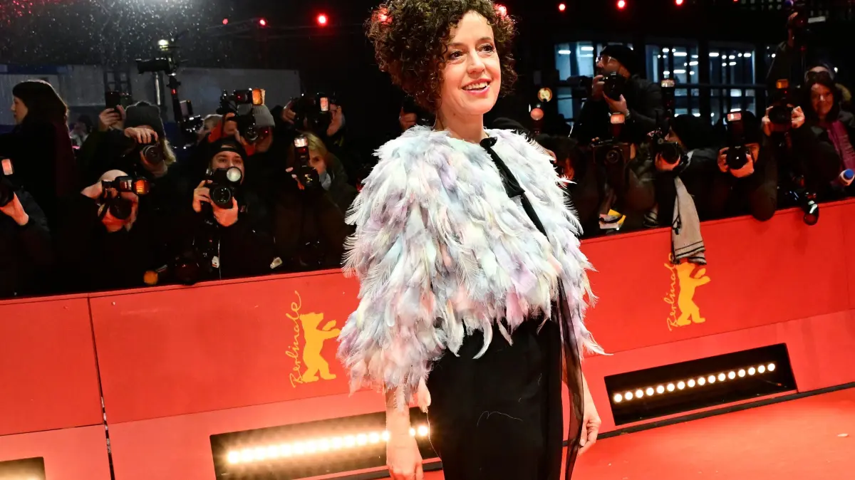776282771: Jury member and German actress and director Maria Schrader poses for photographers upon arrival on the red carpet for the opening ceremony and the screening of the film ?Das Licht? (The light) in the "Berlinale special" section of the 75th Berlinale, Europe's first major film festival of the year, in Berlin on February 13, 2025. (Photo by John MACDOUGALL / AFP)