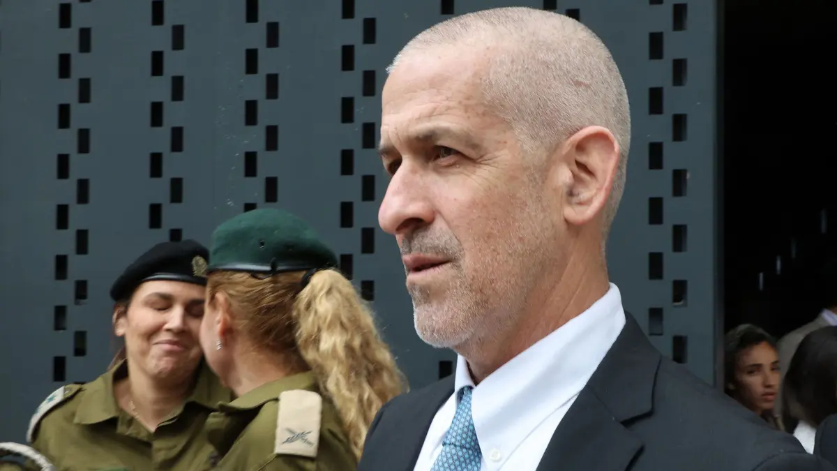 (FILES) Ronen Bar, chief of the Israel Security Agency (also known as Shabak or Shin Bet), attends a ceremony marking Memorial Day for fallen soldiers of Israel's wars and victims of attacks at Jerusalem's Mount Herzl military cemetery on May 13, 2024. Israeli Prime Minister Benjamin Netanyahu's office said on April 1 that he had reversed a decision to appoint former navy commander Vice Admiral Eli Sharvit as security agency chief following criticism, including from a key US senator. Netanyahu had announced Sharvit's appointment the previous day, pushing back against a supreme court decision to freeze his government's move to dismiss incumbent director Ronen Bar. (Photo by GIL COHEN-MAGEN / POOL / AFP)