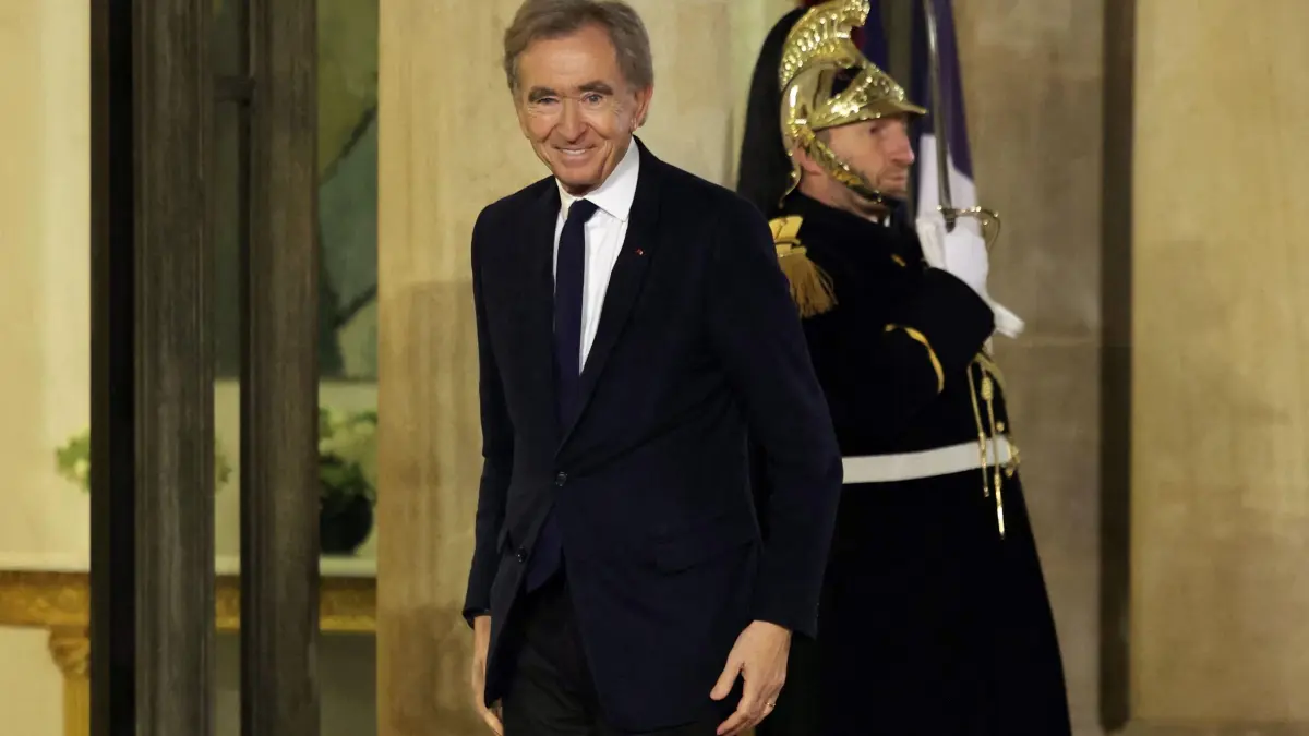 (FILES) French businessman Bernard Arnault arrives to attend a European heads of state meeting on the sideline of the Artificial Intelligence (AI) Action Summit, at the Elysee palace, in Paris, on February 10, 2025. Paris has everything -- stunning architecture and arguably the best food and fashion in the world. But the French capital lacks one essential element of a modern metropolis: it has no football rivalry. Despite Qatar-owned Paris Saint-Germain spending vast sums in recent years assembling a team featuring superstars like Lionel Messi, Neymar and Kylian Mbappe, and the club reaching this year's Champion's League semi-final, the city has never truly been a football crucible. (Photo by Thomas SAMSON / AFP)