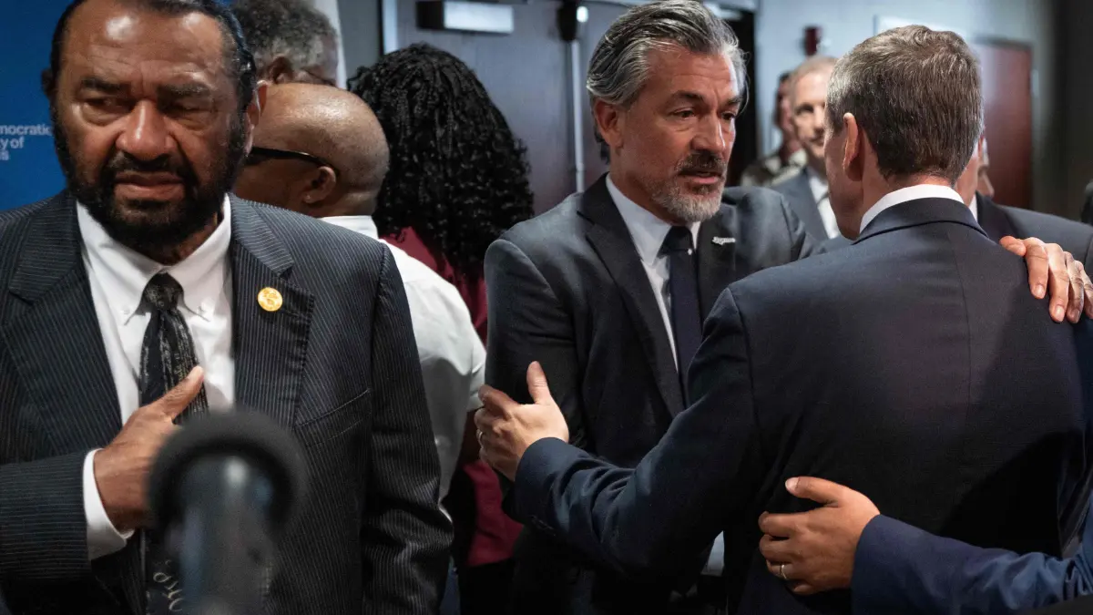 Texas Democratic Lawmakers Flee State In Effort To Halt Redistricting Legislation: AURORA, ILLINOIS - AUGUST 05: Rep. Al Green (D-TX) and state Rep. Romon Romero Jr. attend a press conference with Texas House Democrats at the International Union of Painters and Allied Trades union hall on August 05, 2025 in Aurora, Illinois. Democratic Texas lawmakers left the state on Sunday to prevent a quorum from being reached during a special session called to redistrict the state in favor of Republican candidates. Scott Olson/Getty Images/AFP (Photo by SCOTT OLSON / GETTY IMAGES NORTH AMERICA / Getty Images via AFP)