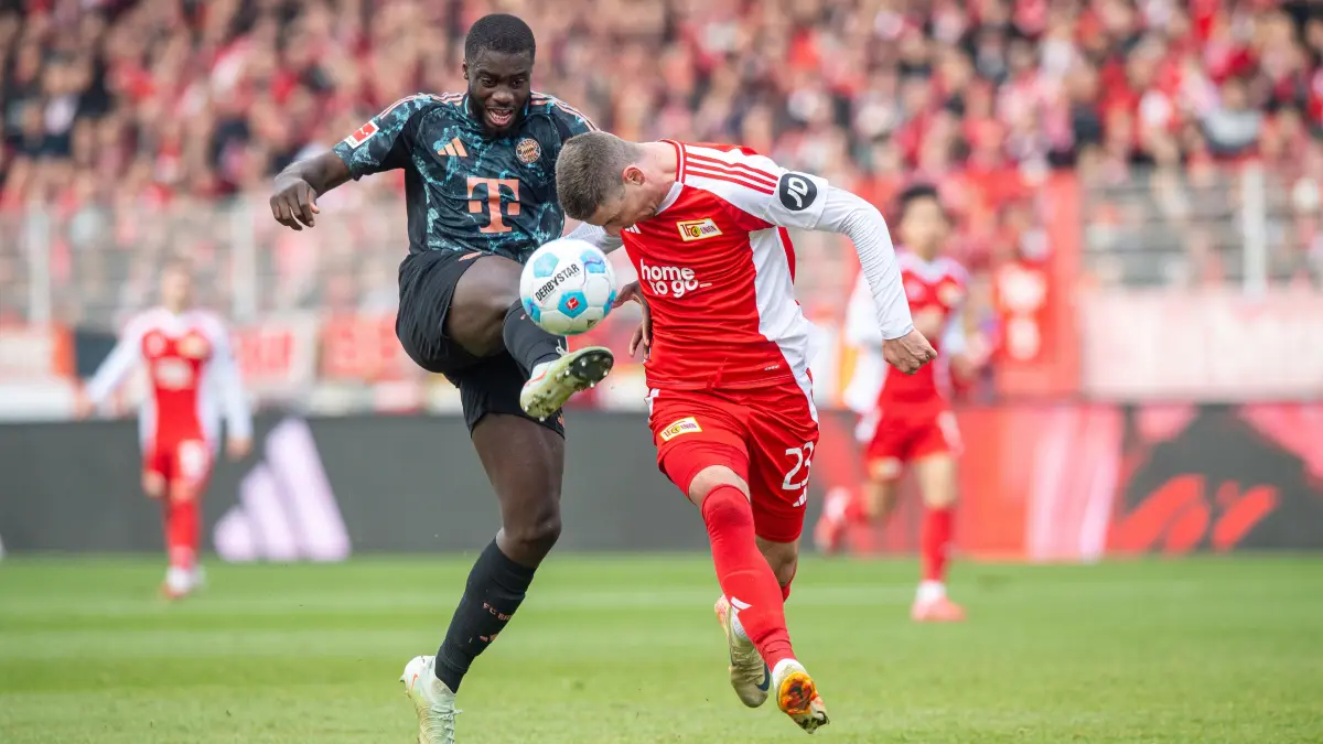 Fußball, Herren, Saison 2024/2025, 1. Bundesliga (26. Spieltag), 1. FC Union Berlin - FC Bayern München, v. l. Dayot Upamecano (FC Bayern), Andrej Ilic (1. FC Union Berlin), 15.03.2025, Foto: Sebastian Räppold / Matthias Koch
