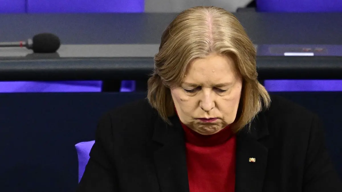 German Minister for Labour and Social Affairs Baerbel Bas attends a plenary session at the Bundestag, Germany's lower house of parliament in Berlin on December 5, 2025. German MP's are voting on a controversial pension package and a new military service plan. (Photo by Tobias SCHWARZ / AFP)