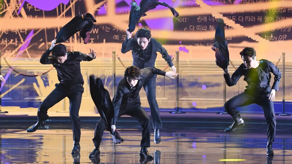(FILES) South Korean boy band BTS performs onstage during the 64th Annual Grammy Awards at the MGM Grand Garden Arena in Las Vegas on April 3, 2022. K-pop megastars BTS will kick off their first world tour in four years in April 2026, their label said on January 14, 2026, part of a hotly-anticipated comeback following a hiatus for the South Koreans whose music has become a global phenomenon. (Photo by VALERIE MACON / AFP)