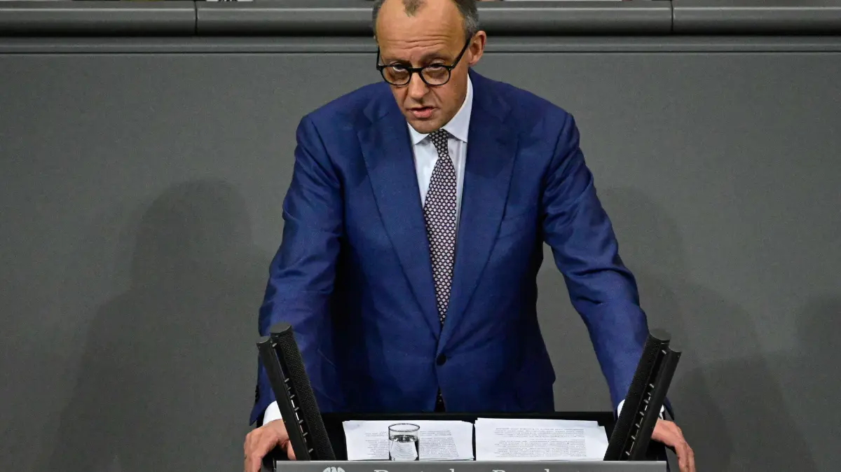 German Chancellor Friedrich Merz delivers a speech on Foreign policy at the Bundestag (lower house of parliament) on January 29, 2026 in Berlin. (Photo by Tobias SCHWARZ / AFP)