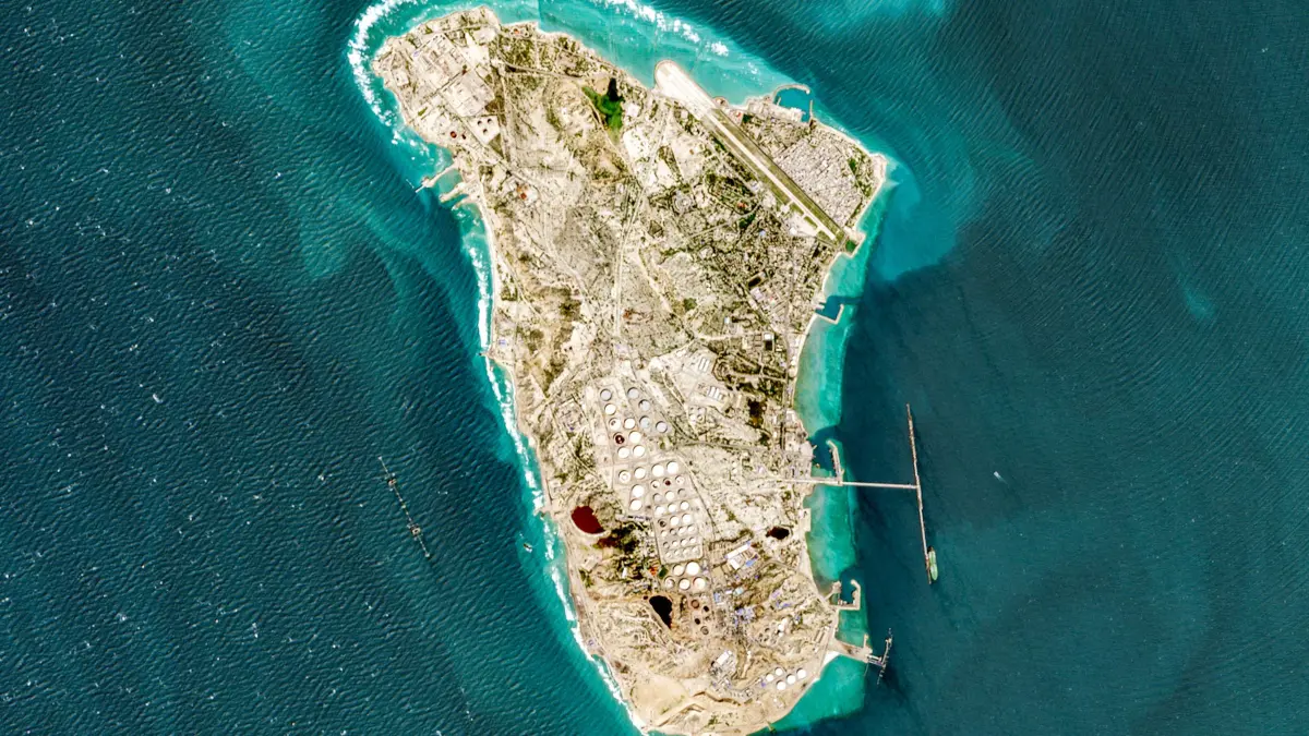 This handout image taken by the European Space Agency (ESA) captured by the Copernicus Sentinel-2 satellite shows a view of Iran's Kharg Island, which hosts the country’s main crude export terminal and is responsible for the overwhelming majority of its oil shipments to the world, about 25 kilometres south of the mainland in the north of the Gulf, on March 2, 2026. (Photo by EUROPEAN SPACE AGENCY / AFP) / RESTRICTED TO EDITORIAL USE - MANDATORY CREDIT "AFP PHOTO / ESA" - HANDOUT - NO MARKETING NO ADVERTISING CAMPAIGNS - DISTRIBUTED AS A SERVICE TO CLIENTS