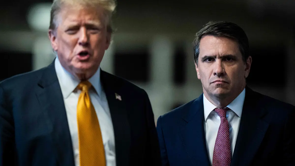 (FILES) Former US President and Republican presidential candidate Donald Trump, with attorney Todd Blanche (R), speaks to the press after the 12 jurors in his criminal trial began deliberating at Manhattan Criminal Court in New York City on May 29, 2024. US media reported on April 2, 2026, that US President Donald Trump has fired Attorney General Pam Bondi. CNN and other US outlets said Deputy Attorney General Todd Blanche, Trump's former personal lawyer, would serve as acting attorney general. (Photo by Jabin Botsford / AFP)