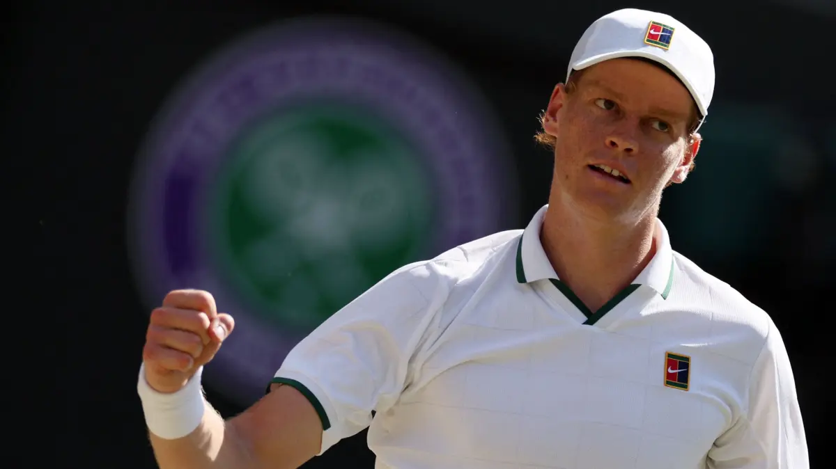 TENNIS-GBR-WIMBLEDON: Italy's Jannik Sinner celebrates beating Germany's Jan-Lennard Struff during their men's singles quarter-final tennis match on the ninth day of the 2026 Wimbledon Championships at The All England Lawn Tennis and Croquet Club in Wimbledon, southwest London, on July 7, 2026. (Photo by Adrian Dennis / AFP) / RESTRICTED TO EDITORIAL USE