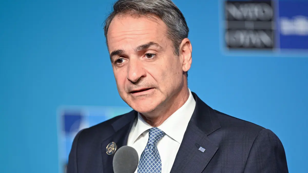 TURKEY-NATO-SUMMIT-DEFENCE: Greece's Prime Minister Kyriakos Mitsotakis addresses the media upon arrival for the NATO summit in Ankara, on July 8, 2026. The summit comes at a fraught time for the 77-year-old transatlantic alliance, with the US President demanding members make good on a pledge to ramp up defence spending as Washington takes a step back from Europe. (Photo by Alexis JUMEAU / POOL / AFP)
