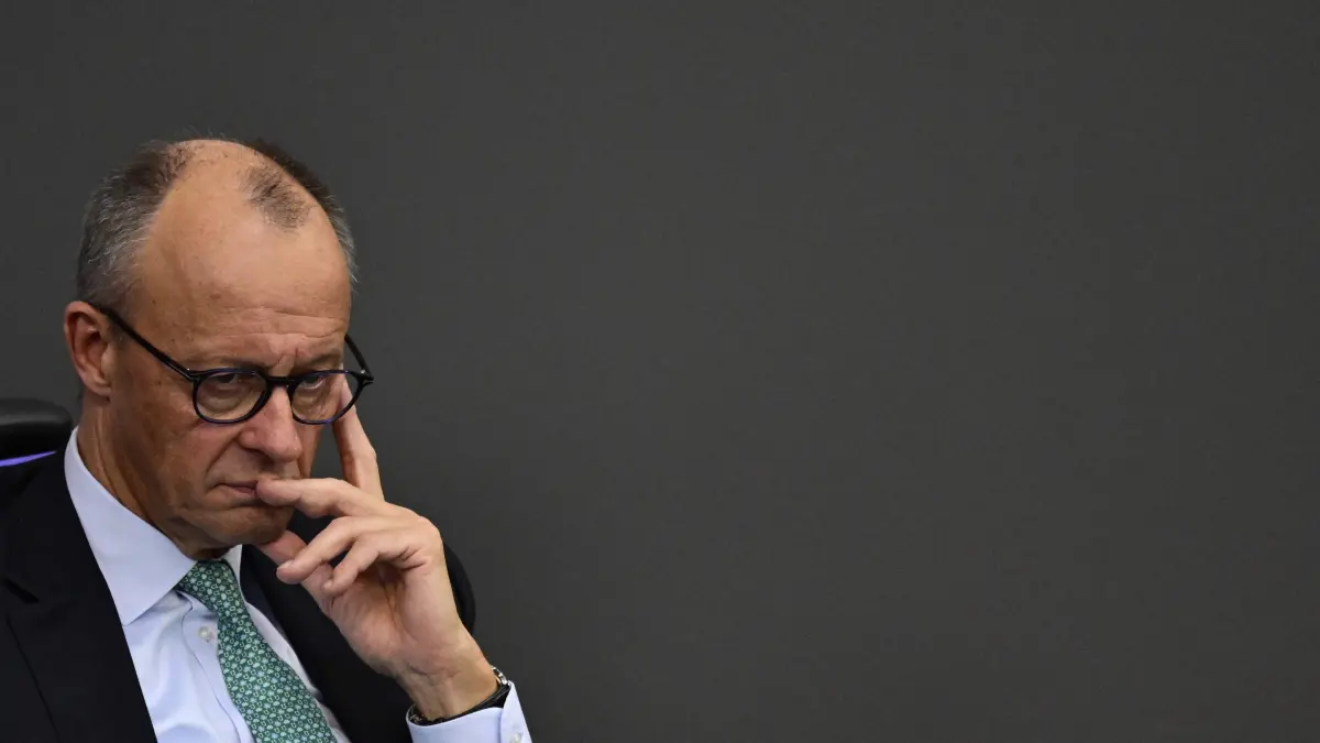 GERMANY-POLITICS-PARLIAMENT: German Chancellor Friedrich Merz attend a debate on October 14, 2026 at the Bundestag (lower house of parliament) in Berlin, on the eve of a two-day EU summit to take place in Brussels from October 15 to 16. (Photo by John MACDOUGALL / AFP)