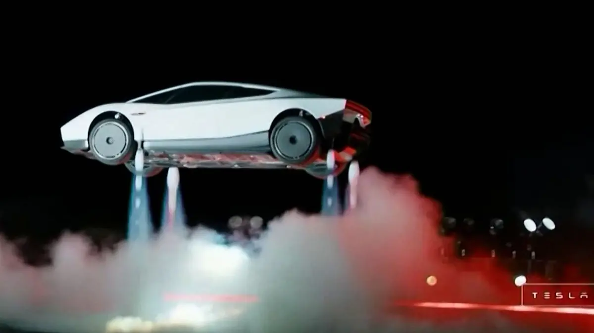 US-AUTOMOBILE-TESLA-MUSK: A grab taken on October 16, 2026 from a live feed released by Tesla shows the company unveiling on October 15 its next-generation Roadster electric car in McGregor, Texas, United States. (Photo by Tesla / AFP) / RESTRICTED TO EDITORIAL USE - MANDATORY CREDIT "AFP PHOTO / TESLA" - HANDOUT - NO MARKETING NO ADVERTISING CAMPAIGNS - DISTRIBUTED AS A SERVICE TO CLIENTS