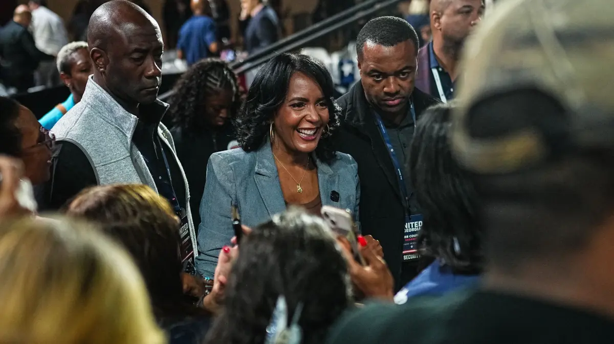 Georgia Democratic Candidates Jon Ossoff And Keisha Lance Bottoms Campaign Ahead Of Midterm Elections: MARIETTA, GEORGIA - OCTOBER 17: Georgia Democratic gubernatorial candidate Keisha Lance Bottoms (C) greets supporters at a campaign event on October 17, 2026 in Marietta, Georgia. Bottoms is facing Republican Gubernatorial nominee Rick Jackson and Ossoff is facing Republican Sen. Mike Collins for the senate. Elijah Nouvelage/Getty Images/AFP (Photo by Elijah Nouvelage / GETTY IMAGES NORTH AMERICA / Getty Images via AFP)